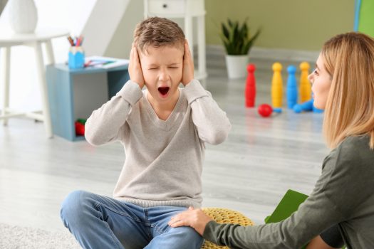 Child covering ears